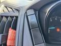 Close-up of the dashboard controls in a 2016 Ford Transit 150 including a switch for traction control system labeled TCS OFF