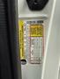 A 2013 Ford E-350 tire and loading information label detailing tire pressures and loading capacities