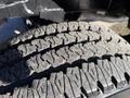 A close-up view of a tire tread on a 2023 RAM 3500 showcasing detailed patterns and grooves designed for traction and durability