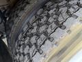 Close-up view of a worn tire on a 2011 International 7500 showing visible tread patterns and surface wear