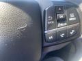 Close-up of the steering wheel controls of a 2020 Ford Explorer including buttons for ok menu navigation and phone functions