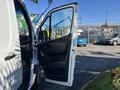 A 2021 Mercedes-Benz Sprinter 2500 with the driver's side door open showing the interior with a dark dashboard and seating area