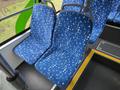 Two blue patterned seats inside a 2018 Grande West Vicinity bus