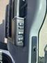 Interior view of a 2016 Ford F-350 SD showing the control panel with multiple buttons for window and door functions