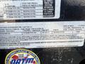 Label detailing specifications and compliance for a 2020 Load Trail 28 Foot Gooseneck trailer including weight ratings and tire information