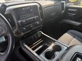 Interior view of a 2017 Chevrolet Silverado 1500 showing the dashboard center console and front seats with controls and displays visible