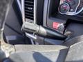 Close-up of a 2014 RAM 5500 steering column with a turn signal lever and windshield wiper control