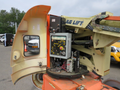 A 2009 JLG E300AJP aerial lift with control panel and safety features visible on the side