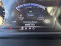 Dashboard display of a 2018 RAM 3500 showing fuel efficiency and range with a total distance of 96949.8 kilometers