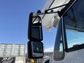 Close-up of the side mirrors on a 2008 International 7500 truck showcasing a dual mirror setup for improved visibility