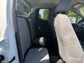 Interior of a 2017 Chevrolet Colorado featuring two rows of seating with grey upholstery and a spacious layout