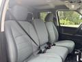 Interior of a 2016 RAM 1500 showing front seats with grey upholstery and seatbelts fastened