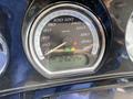 Close-up of the speedometer and odometer display on a 2017 Harley-Davidson FLHTKL showing a reading of 046254 km with a neutral indicator light illuminated
