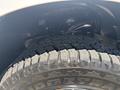 Close-up of a 2019 Ford F-150 tire showcasing the tread pattern and rugged design suitable for off-road driving