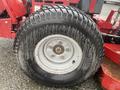 Close-up of a large, textured tire from a 2017 Ferris Rotary showing a rugged tread pattern and metallic wheel rim