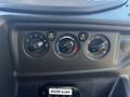 Dashboard controls for climate and ventilation in a 2017 Ford Transit-350 featuring knobs for fan speed temperature and air conditioning