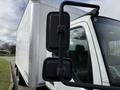 A 2008 International CityStar truck featuring a side mirror with dual reflective surfaces and a white cargo box in the background