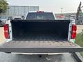 A 2017 Chevrolet Silverado 1500 with an open truck bed showing a clean, empty interior designed for hauling cargo