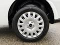 A close-up of a silver alloy wheel from a 2017 RAM ProMaster City featuring a five-spoke design and a black tire with the brand name Instinct visible