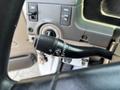 Close-up of a turn signal stalk from a 2006 Sterling Acterra with labeled settings for turn signals and windshield wipers