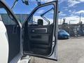 A 2014 RAM 5500 truck with an open driver's door showing the interior handle and door panel
