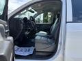Interior view of a 2020 Chevrolet Silverado showing the driver's seat dashboard and passenger seat with gray upholstery