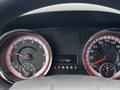 Dashboard of a 2014 RAM Cargo Van featuring speedometer and tachometer with red accents odometer reads 115708 km gear shift indicator displayed