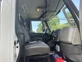 Interior view of a 2012 International 7300 Workstar showing the driver's seat dashboard and controls