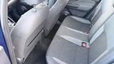 A 2019 Nissan Kicks with a rear seating area featuring two seats with fabric upholstery and seat belts