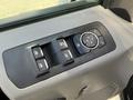 Control panel with window buttons and a rotary dial in a 2018 Ford F-150