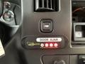 2015 Chevrolet Express dashboard with an interlock system panel displaying a door ajar indicator and multiple red lights