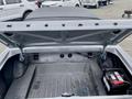 The image shows the trunk of a 1968 Ford Mustang Two Door Convertible with a battery and no cargo inside