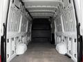 Interior of a 2019 Mercedes-Benz Sprinter van showing a spacious cargo area with a flat floor and walls designed for storage or transportation purposes