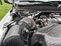 Engine compartment of a 2024 RAM 5500 showing the air intake system along with various engine components and wiring