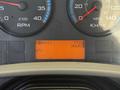 Dashboard of a 2017 International 4300 showing RPM gauges speedometer and an orange display with the hour count and temperature