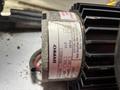A close-up of a HYPRO pump motor label showing specifications including model number 257000013 horsepower 28.5 and RPM information