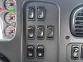 Control panel of a 2016 Freightliner 108SD featuring various switches and gauges for vehicle functions