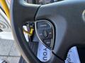 Close-up of the steering wheel controls of a 2022 Lion Lion6 showing buttons for cancel set off on and res