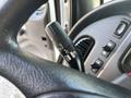 Close-up of the turn signal lever on a 2019 Freightliner M2 106 showing various control settings for lights and signals