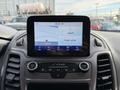 A dashboard display of a 2020 Ford Transit Connect showing options for audio settings and phone connectivity