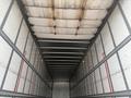 Interior of a 2010 Great Dane 45-foot trailer featuring metal walls with red numbers indicating measurements on either side