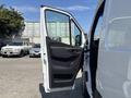 A 2019 Mercedes-Benz Sprinter with the driver's side door open showcasing the interior design and door panel features