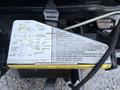 A 2023 Ford F-250 truck with a detailed user manual showing instructions for connecting and using the jack and headgear components