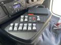 Control panel of a 2020 Chevrolet Express featuring various buttons and knobs for vehicle functions including lights and other controls