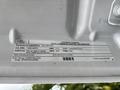 Label on a 2013 Ford F-250 SD detailing vehicle emission control information and specifications