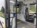 Interior view of a 2018 Grande West Vicinity bus showcasing the driver's cockpit with a seat dashboard and control panel