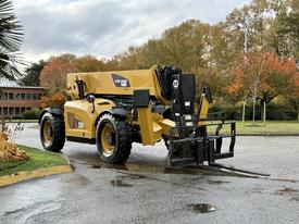 A 2014 Caterpillar TL1055C telescopic handler with a yellow and black exterior featuring a front fork attachment and large tires