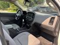 Interior view of a 2017 Chevrolet Colorado showing the front seats dashboard and center console with various controls and displays
