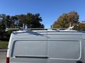 A 2024 Mercedes-Benz Sprinter 2500 with roof-mounted equipment and antennas