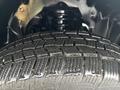 Close-up of a 2011 Chevrolet Colorado tire showing detailed tread pattern and surface texture with visible grooves and ridges